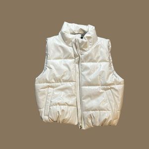 Shiny faux leather puffer vest.